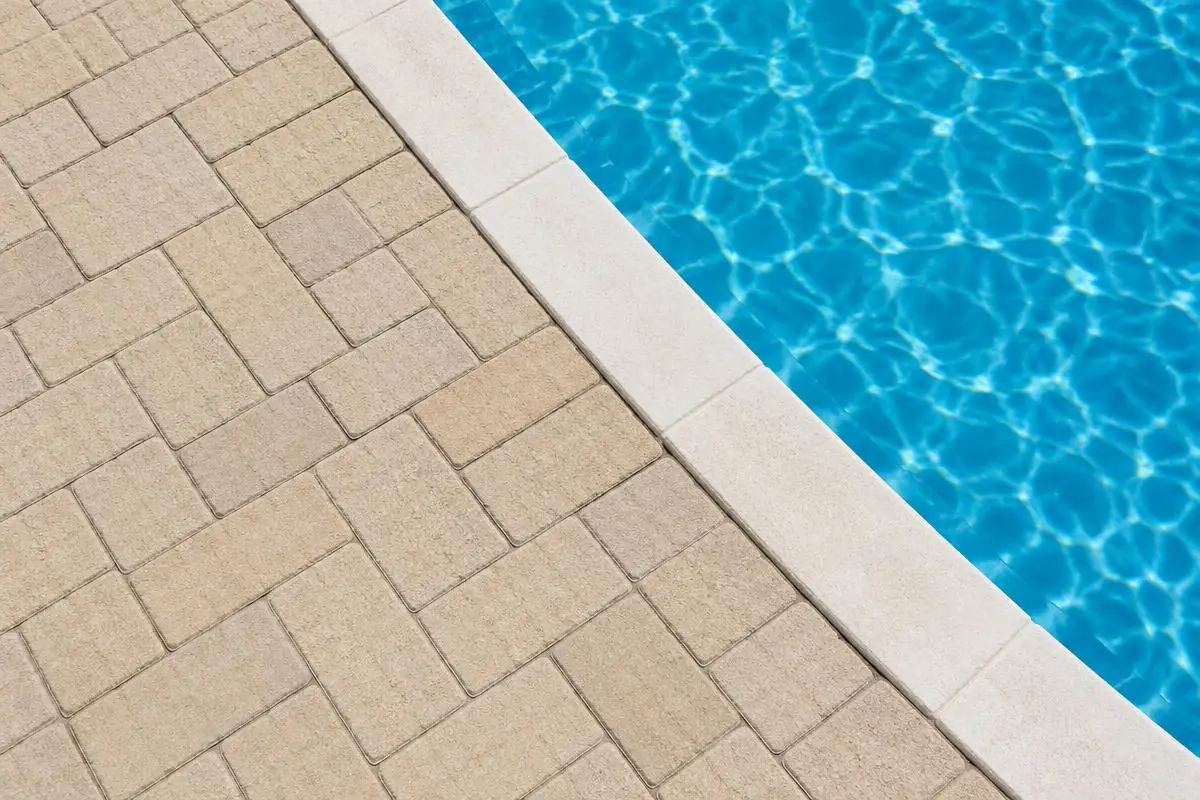 Same pool pavers clean and sand colored after service